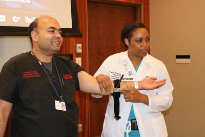 NYU Winthrop Hospital-Dr. Fahd Ali and Dr. D'Andrea Joseph instruct a Stop the Bleed class in the use of a tourniquet