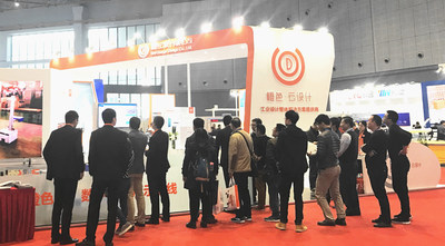 Visitors are visiting and interacting with staff at the exhibition booth of Uni-Orange on CIIF.