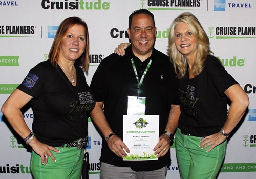 Cruise Planners® franchise owner, Michael Consoli, receiving #1 River Cruise Agent from Michelle Fee & Vicky Garcia, one of 6 awards Michael received at this years convention.