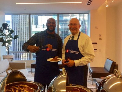 L-to-R: Amani Toomer, former New York Giants player; Brad Rothbaum, Chief Operating Officer, BMO Capital Markets (CNW Group/BMO Financial Group)