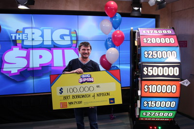 Bert Bobrowich of Nipigon celebrates after spinning THE BIG SPIN Wheel at the OLG Prize Centre in Toronto to win $100,000. Bobrowich won a top prize with OLG’s new INSTANT game – THE BIG SPIN. (CNW Group/OLG Winners)