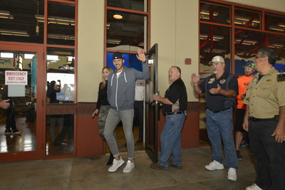 2017 World Series Champion and Houston Astros shortstop, Carlos Correa and fiancé, Daniella Rodriguez, in partnership with Vamos A Pescar, surprised more than 100 families at Bass Pro Shops in Katy, TX. (Credit: Anthony Rathbun, AP Newswire)