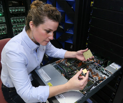 The IBM POWER9 processor delivers unprecedented speeds for deep learning and AI workloads. IBM Engineer, Stefanie Chiras tests the IBM Power System server in Austin, Texas. (Photo Credit: Jack Plunkett/Feature Photo Service for IBM).