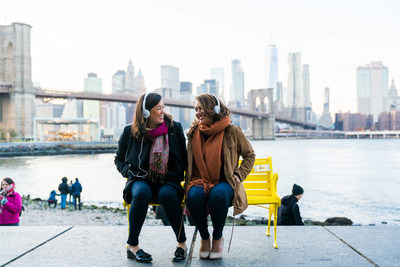 Co-CEOs Naomi Hirabayashi and Marah Lidey ‘press pause’ on Shine’s iconic yellow bench in celebration of the app’s launch.
