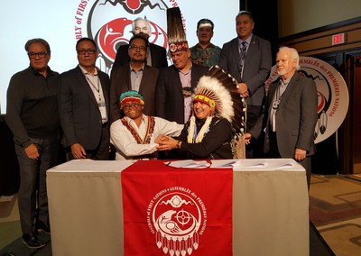 AFN National Chief Perry Bellegarde (right) and Domingo Paes from Ecuador (left) signed protocol to hold Chevron accountable for environmental damage in Ecuador at the AFN Special Chiefs Assembly in Ottawa, Ontario. (CNW Group/Assembly of First Nations)