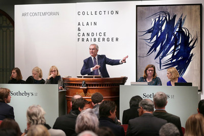 Philipp Herzog von Württemberg, Sotheby's European Chairman, fields bids during the Company's recent sales of Contemporary Art in Paris that totaled $51.1 million.