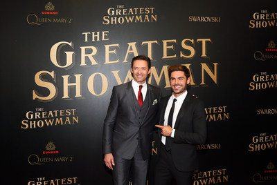 Hugh Jackman, left, and Zac Efron attend as Cunard Hosts the World Premiere of 20th Century Fox’s “The Greatest Showman” on board Queen Mary 2 on Friday, Dec. 8, 2017, in Brooklyn, N.Y. This is the first ever major motion picture premier to take place on board a passenger ship. (Photo by Stuart Ramson/Invision for Cunard/AP Images)