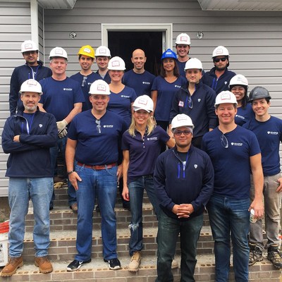 Team Semper at a Habitat for Humanity build site in Queens