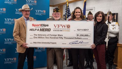 Sport Clips Haircuts donated $1.25 million to the Veterans of Foreign Wars Foundation today for Help A Hero Scholarships for U.S. service members and veterans. (L to R) Gordon Logan, Sport Clips Haircuts founder and CEO and an Air Force veteran, made the presentation to VFW National Commander Keith E. Harman; along with Amanda Palm, Sport Clips corporate communications manager, who oversees the Help A Hero program; and Martha England, Sport Clips vice president of Marketing.