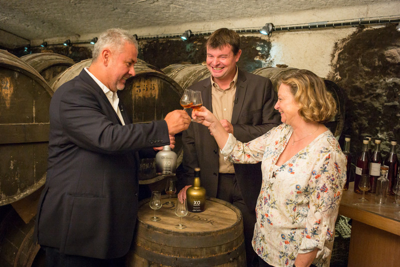 Hernan Parra (Dictator Rum Master Distiller), Mickaël Bouilly (Hardy Cognac Cellar Master), and Bénédicte Hardy (owner of Hardy Cognac) toasting the 2 Masters project.
