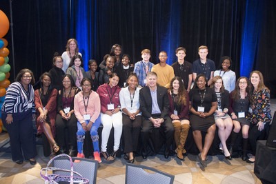 Rob Siegfried, the CEO and Founder of The Siegfried Group, poses with students following a Siegfried Youth Leadership Program event at the University of Delaware.