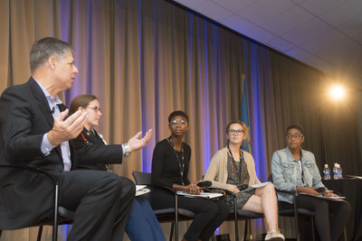 Rob Siegfried, the CEO and Founder of The Siegfried Group, speaks with a panel of students at Siegfried Youth Leadership Program event.