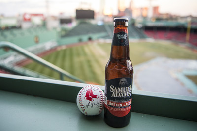 December 7, 2017, Boston, MA:
A baseball autographed by Samuel Adams Founder Jim Koch and Boston Red Sox President and CEO Sam Kennedy is displayed next to a bottle of beer during the announcement of a partnership at Fenway Park in Boston, Massachusetts Thursday, December 7, 2017. 
(Photo by Billie Weiss/Boston Red Sox)