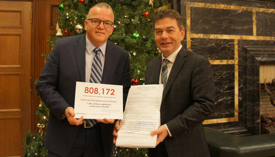 The Hope for Middle East petition is presented to Mr. David Anderson in Centre Block on Parliament Hill by Gary Stagg, Executive Director, Open Doors Canada on December 11, 2017. Shortly after, the petition was presented by Mr. Anderson to the House of Commons, Government of Canada (CNW Group/Open Doors Canada)