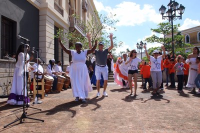 Puerto Rico announces it's officially Open for Tourism. The Island welcomed over 7,000 cruisers this past November 30, the first batch of passengers following Hurricanes Irma and Maria from cruises making a transit stop on the Island. Tourists are seen here dancing on the streets enjoying an extremely warm welcome from local performers. Puerto Rico is expecting 85,000 more passengers through January 31, 2018, proving once again Puerto Rico’s comeback as a major vacation spot.