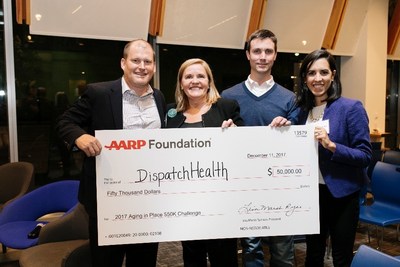 AARP Foundation President Lisa Marsh Ryerson and Rock Health CEO and Managing Director Bill Evans present check to DispatchHealth, the winners of the 2017 Aging in Place $50K Challenge. Photographer Credit: Kara Brodgesell.