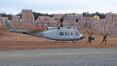 Marines conduct a re-supply mission during a demonstration of Aurora's autonomous UH-1H developed for ONR's AACUS program