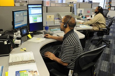 DTE Energy customer service representatives answer calls from customers.