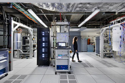 An IBM quantum scientist walks across the IBM Q computation center at the TJ Watson Research Center in Yorktown Heights, NY. The new center houses IBM's most advanced quantum computers, accessed via IBM Cloud by IBM Q Network clients. The clients from Fortune 500 companies, academic institutions, and national research labs, hailing from across the globe, are collaborating with IBM to advance quantum computing, exploring practical applications for business and science. (Photo by Connie Zhou)