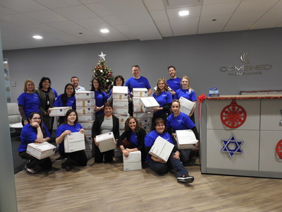 Combined Insurance employees assembled 100 'Sweet Home Chicago'  care packages for deployed Illinois service members in partnership with the USO of Illinois.