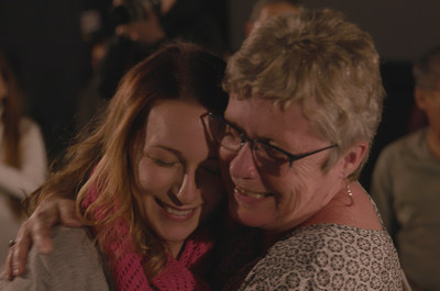 Nicole Deguise and her mother, Irene Rochefort, embrace after Cineplex orchestrated a surprise family reunion at one of its theatres just in time for the holidays. Watch their story at Cineplex.com/TheGreatestJoy. (CNW Group/Cineplex)