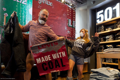 Climate activists with Stand.earth’s “Too Dirty to Wear” campaign take off their jeans and dance at Levi’s flagship store in San Francisco, as part of a flash mob to protest Levi's climate pollution impacts and call on the company to transition the factories that supply its jeans away from coal and toward renewable energy. Photo and video by Survival Media Agency