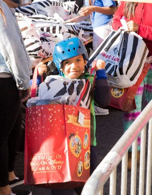 10,000 homeless and poor kids get 50,000 new toys at the Fred Jordan Mission Christmas Toy Party.