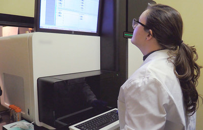 Shown here, a Zymo Research scientist identifying various reliable epigenetic biomarkers that will help determine the optimum frequency and duration of Xenon-containing liposome delivery.