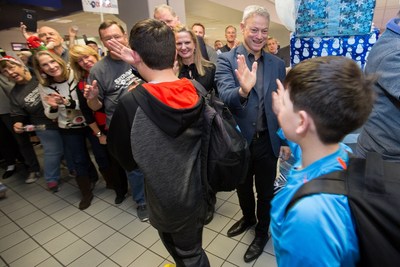 Gary Sinise greets Gold Star families at Dallas International Airport as they arrive for the eleventh annual Snowball Express which will officially become a program of the Gary Sinise Foundation in 2018.