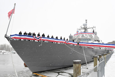 Sailors assigned to the Freedom-variant littoral combat ship USS Little Rock (LCS 9) man the ship’s rails during the commissioning ceremony on the Buffalo River on Dec. 16. Photo credit: Lockheed Martin.