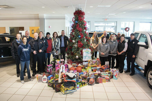 Holiday Automotive with Fond du Lac Cops For Kids toy drive donation.