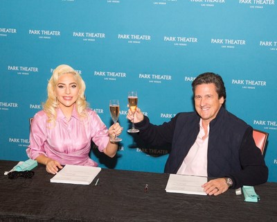 Lady Gaga and MGM Resorts International President Bill Hornbuckle toast to the artist’s two-year engagement at Park Theater in Las Vegas. Credit: Alex Dolan