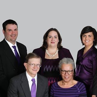 From Left to Right Back Row: Kenneth Gerlach, Chief Operating Officer; Jennifer Rusz, Chief Executive Officer; Erica Williams, Director of Business Development Bottom Left to Right: David Wilkins Chief Operating Officer and Gwendolyn Moore, Executive Assistant Picture by: Mary Buck and Lightscapes Portrait Studio