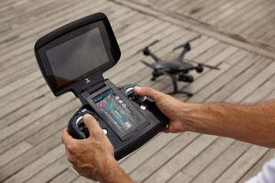 The carbon fiber monocoque chassis of the XDynamics Evolve drone strengthens structural stability and improves flight dynamics. Its remote controller is a smart pilot system which embeds a 7-inch viewfinder, 5-inch touch control panel, processing hardware, and software in an all-in-one package.