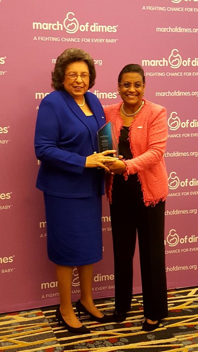 Dr. Mary Breaux Wright, Zeta Phi Beta Sorority, Incorporated international president, left, accepts a 45th Anniversary Stork’s Nest Award from Stacey D. Stewart, March of Dimes president, right, during the 2017 March of Dimes National Service Partner Summit.