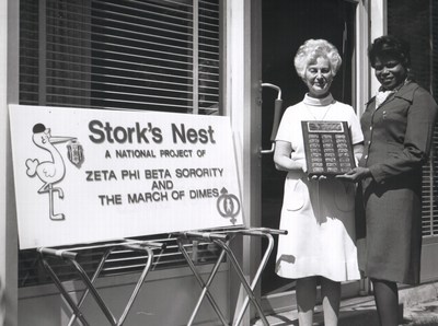 Elaine Whitelaw, longstanding chief fundraiser for March of Dimes, left, and Dr. Janice Kissner, Zeta Phi Beta Sorority, Incorporated 17th international president and March of Dimes community affairs director, right, showcase the newly formed partnership in the early 1970s.