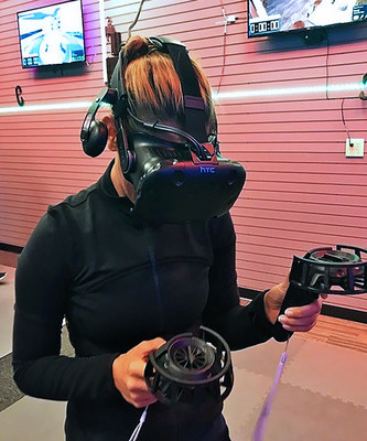 Injured veterans and their guests donned virtual reality gear to experience the latest in gaming technology.