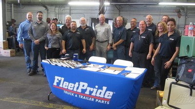 Members of FleetPride management join team members from the company's Phoenix location to mark the grand reopening of the branch and its new hydraulic shop.