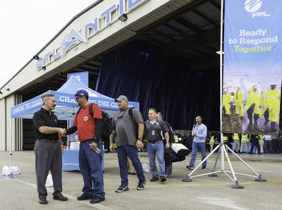 Bryan Olnick, Florida Power & Light Company’s (FPL) vice president of distribution operations, thanks company lineworkers who are leaving to restore power to Puerto Rico from Palm Beach International Airport in West Palm Beach, Fla., Jan. 8, 2018. FPL sent 140 lineworkers and support staff to help restore power to hundreds of thousands of people who remain without power nearly four months after Hurricane Marie devastated the island.