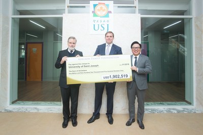 Las Vegas Sands and Sands China executives present a US$1.9 million (approximately MOP 15.4 million) cheque to the University of Saint Joseph on behalf of the Adelson Family Foundation Tuesday at the university. Left to right: Fr. Peter Stilwell, rector, University of Saint Joseph; Patrick Dumont, executive vice president and chief financial officer, Las Vegas Sands Corp.; Dr. Wilfred Wong, president, Sands China Ltd.