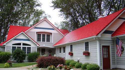 Bright roof colors are captivating homeowners' attention in 2018. Photo courtesy of American Metal Roofs of Michigan