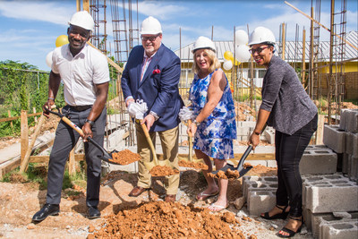 Master Spas celebrates the groundbreaking of NAZ Children's Centre's new mixed-ability high school in Montego Bay, Jamaica. Shown left to right: Oniel Campbell, Bob Lauter, Sherry Lauter, Alixann Narcisse-Campbell.