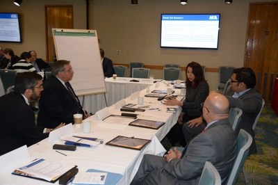 MDAD Chief of Staff Joseph Napoli (far right) and Marketing Division Director Chris Mangos participate in a break-out session