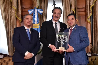 Israeli Ambassador Mttanya Cohen with President Morales Accepting Friend of Zion Award from Dr. Mike Evans.