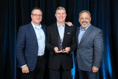 itelligence employees Dave Hutchins, Regional Vice President, Steve Niesman, President and CEO North America, and Ed Walovitch, Senior Vice President of Sales, receive the SAP North America Partner Excellence Award 2018 for SAP Platform Solutions