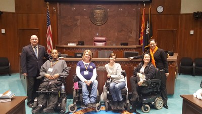 United Spinal Accessible Arizona members with Majority Leader John Allen (on left) at the Arizona House of Representatives and United Spinal VP, Government Relations, Alexandra Bennewith (on right)