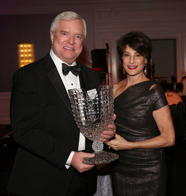 Lewis R. Sifford (left) of Dallas received the American Board of Trial Advocates Lifetime Achievement Award, presented by ABOTA National President, Cynthia McGuinn (right). He is the ninth recipient of the award in the organization's 60-year history.