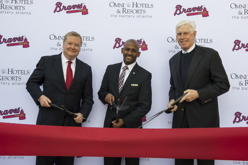 Left to right: Jim Caldwell (CEO, Omni Hotels & Resorts), Ramon Reyes (GM, Omni Hotel at The Battery Atlanta) and Terry McGuirk (Chairman & CEO, Atlanta Braves) at the ribbon cutting, celebrating the official opening of the Omni Hotel at The Battery Atlanta on January 25, 2018.