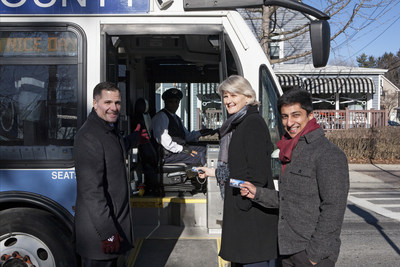 Dutchess County Executive Marcus Molinaro looks on as Vassar College President Elizabeth Bradley and Vassar Student Government Association President Anish Kanoria show their college IDs as they board a County bus in Poughkeepsie, NY Thursday, Jan. 25, 2018. (Photo Credit: Roman Iwasiwka)