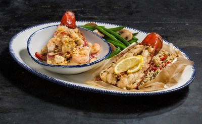 During Lobsterfest, Red Lobster® guests can enjoy its NEW! Dueling Lobster Tails™ –  Maine lobster tail steamed in parchment paper with fresh herbs, tomatoes and lemon, paired with a grilled Maine lobster tail topped with shrimp, bay scallops and roasted bell peppers in a rich sherry lobster cream.